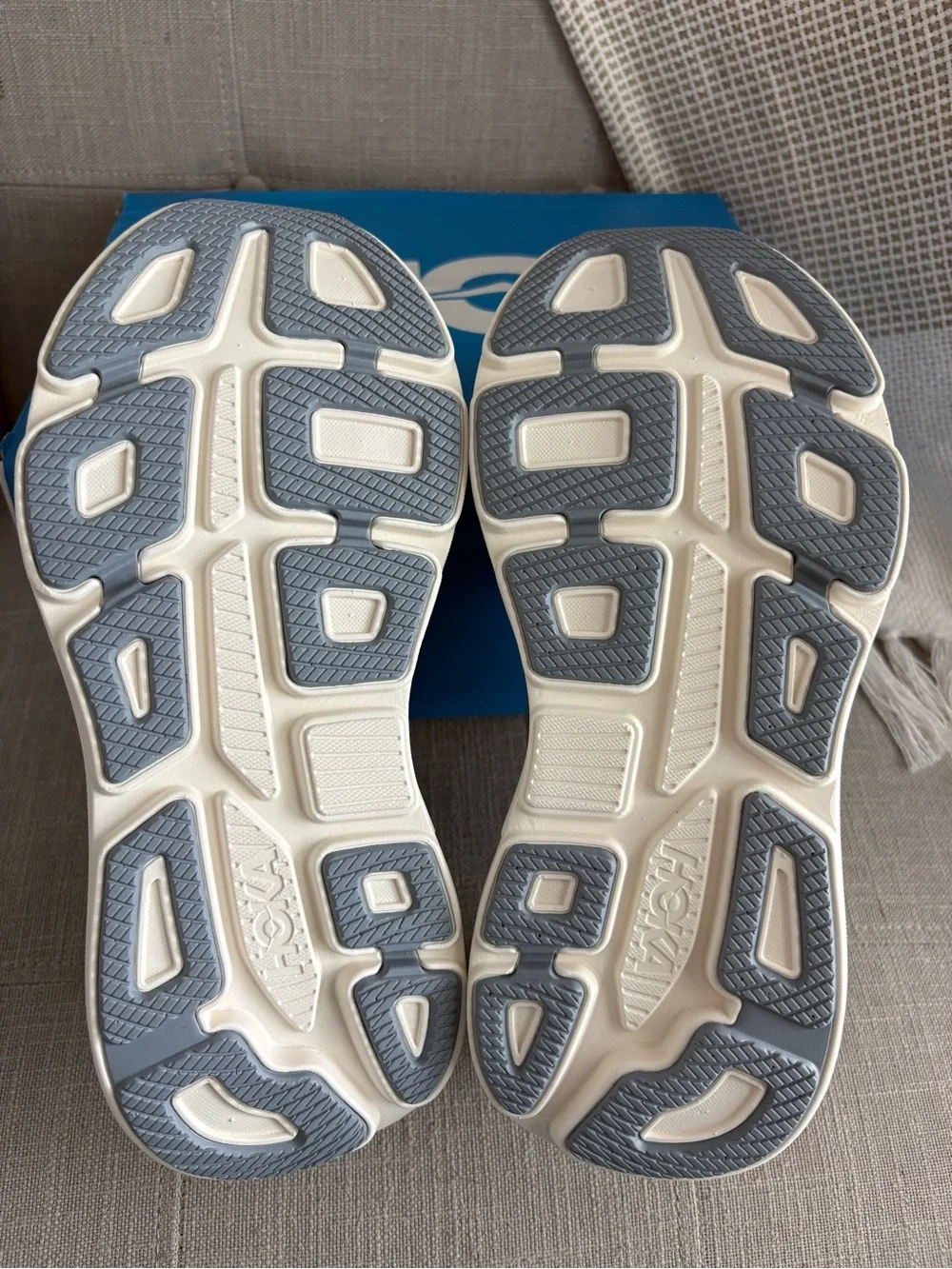Hoka Women's Bondi 9 Light Gray Running Shoes with Red and Light Blue Accents